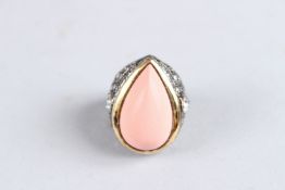 A SILVER CORAL AND DIAMANTE RING. Ring size M.