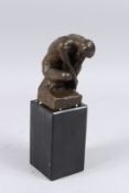 AFTER A. RODIN. A BRONZE , THE THINKER. Signed, on a marble base. 5ins high.