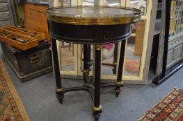 A 19TH CENTURY EBONISED DERBYSHIRE CIRCULAR OCCASIONAL TABLE, the brass galleried marble top inset