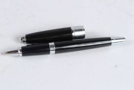 A CROSS PEN in a box.