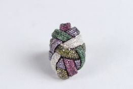 A SILVER ENTWINED ROPE MULTI-COLOURED RING. Ring size M.