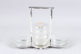 A SILVER PLATED AND GLASS JAM SET.
