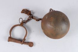 A BALL AND CHAIN.