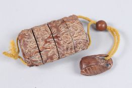 A FOUR DIVISION WOODEN INRO. 3.5ins diameter.