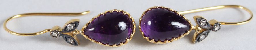 A PAIR OF 9CT YELLOW GOLD AND SILVER DROP EARRINGS set with oval cabochon amethysts with rose cut