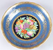 A MINTON BLUE GROUP FRUIT BOWL. 10ins diameter and a blue and gilt oval sucrier and cover.