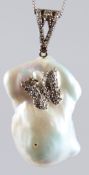 A SILVER BAROQUE PEARL PENDANT with a diamond set butterfly and diamond set bale, on a silver chain,