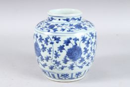 A CHINESE BLUE AND WHITE MING STYLE VASE. 7ins high.