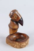 A RARE EARLY 20TH CENTURY SIGNED YZ BIRD ASHTRAY with cherry amber Bakelite beak. 4ins high.