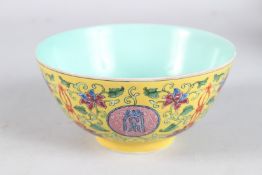 A CHINESE FAMILLE ROSE ENAMELLED BOWL decorated with four-character Chinse hand writing
