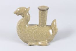 A CHINESE CRACKLE GLAZE WATER DROPPER in the form of a kylin. 5.5ins high.