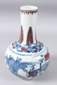 A CHINESE UNDER-GLAZED RED, BLUE AND WHITE VASE.