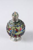 A CHINESE SNUFF BOTTLE with metal mounted bat decoration. 9cms high.