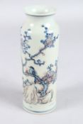 A CHINESE BLUE AND WHITE WITH UNDERGLAZE RED VASE. 19cms high.