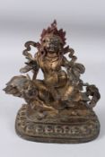 A GILT BRONZE FIGURE OF MAHAKALA TIBET.