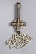 AN 18TH - 19TH CENTURY OTTOMAN PALESTINIAN HOLY LAND MOTHER-OF-PEARL AND OLIVE WOOD CROSS PENDANT