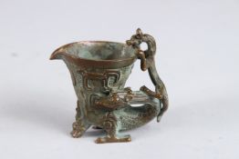 A SMALL BRONZE JUI CUP. 3ins.