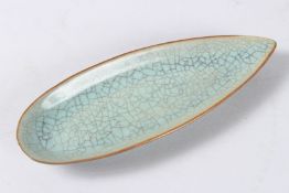 A CHINESE CRACKLE GLAZED LEAF SHAPE BOWL. 18cms diameter.