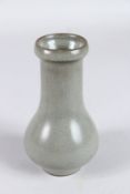 A CHINESE CRACKLE GLAZED BOTTLE VASE. 14.5cms diameter.