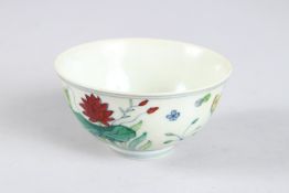 A CHINESE DOUCAI BOWL. 9cms diameter.