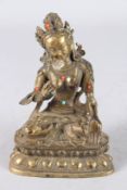 A CHINESE GILT BRONZE SEATED DEITY. 6.5ins high.