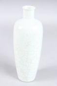 A CHINESE GLAZED WHITE TAPERING VASE.9ins high.
