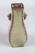 A CHINESE CRACKLE GLAZED SQUARE SHAPED TWIN HANDLED VASE. 16.5cms high.