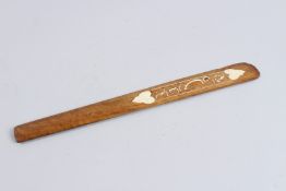A QURAN WOODEN PAGE TURNER with calligraphy in bone. 14ins long.