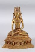A GOOD CHINESE GILDED BRONZE BUDDHA sitting cross-legged, the base with a band of figures and