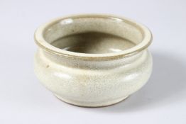 A CHINESE CELADON CIRCULAR BOWL. 5ins diameter x 2.5ins high.