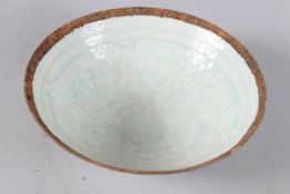 A CHINESE HUTIAN CIRCULAR INCISED BOWL. 6.5ins diameter.