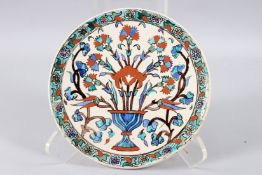 A FINE 19TH CENTURY OTTOMAN TURKISH KUTAHIYA GLAZED POTTERY DISH. 9ins diameter.
