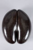 A FINE EXAMPLE OF A COCO DE MER. 13ins long.