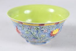 AN UNUSUAL CHINESE MOULDED FLORAL MOTIFS BOWL with six-character mark. 15.5cms diameter.