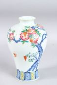 A CHINESE PEACH BLOSSOM VASE. Square mark in blue. 9ins high.