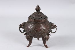 A TIBETAN BRONZE INCENSE BURNER.