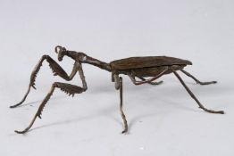 A JAPANESE OKIMONO BRONZE PRAYING MANTIS with articulated leg and wing.