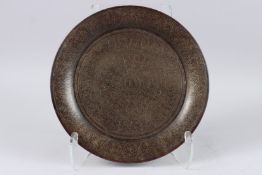 A VERY FINE 19TH CENTURY INDIAN BRASS WIRE INLAID WOODEN CHARGER. 11.5ins diameter.