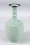 A CHINESE CELADON VASE.