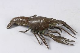 A LARGE JAPANESE ARTICULATED BRONZE LOBSTER. 9.5ins long.