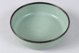 A CELADON GLAZED BOWL.