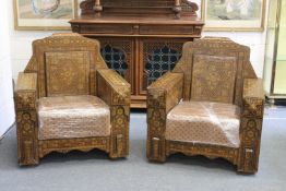 A SUPERB PAIR OF ISLAMIC INLAID ARMCHAIRS with micro mosaic inlay and padded drop-in seats. 3ft wide