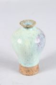 A MINIATURE CHINESE JUN WARE MINGPING VASE. 10.5cms high.
