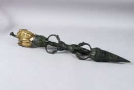 A LARGE TIBETAN GILT BRONZE VAJRA.