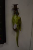 A pair of pottery and ormolu parrot wall sconces.