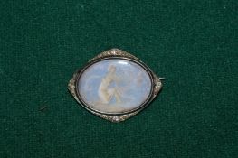 Boucheron, Paris, a good 14ct white gold lozenge shaped brooch inset with a painted panel