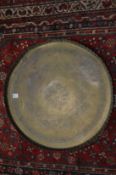 A large Eastern engraved brass tray.