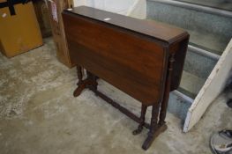 A Victorian walnut Sutherland table.