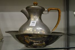 Liberty & Co., a Tudric pewter bowl and hot water jug.