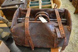An early leather holdall.